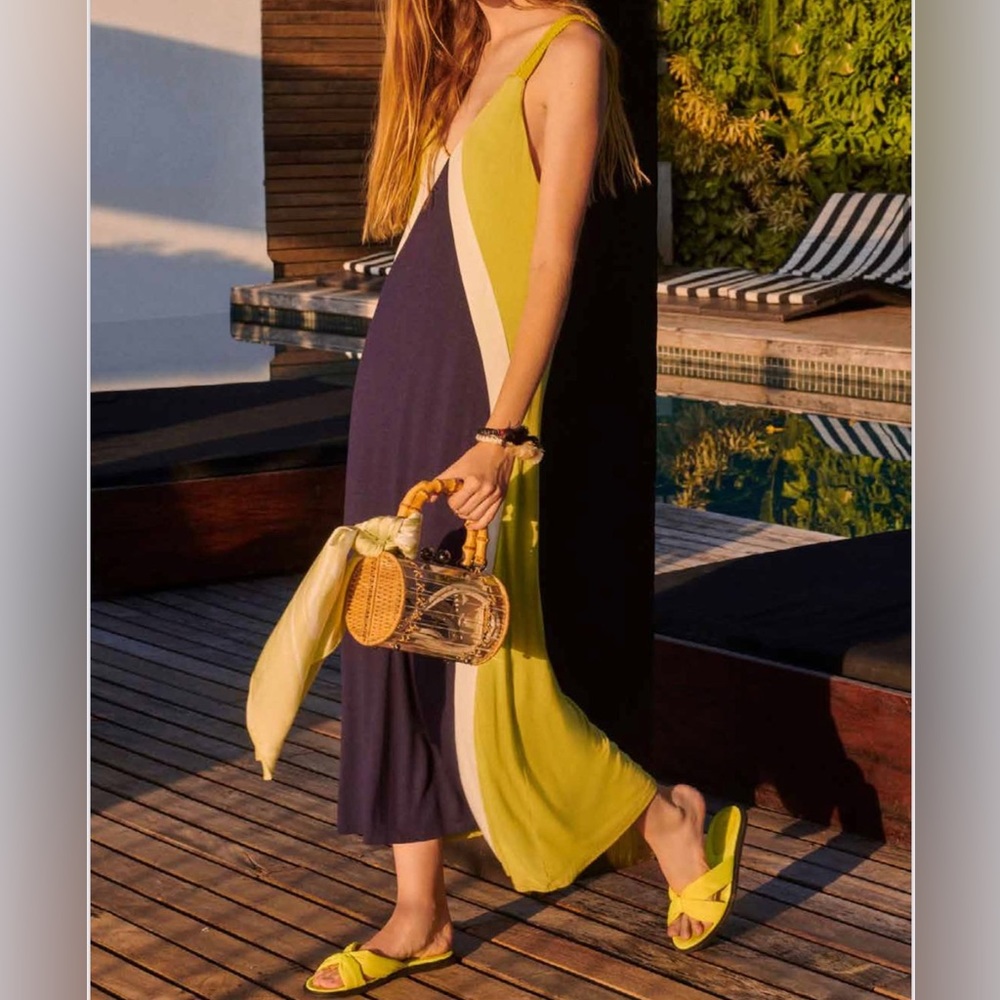 Green dress with braided strap.